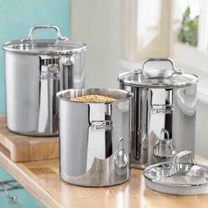 All-Clad three piece canister set. Air tight glass lids. Pristine set .